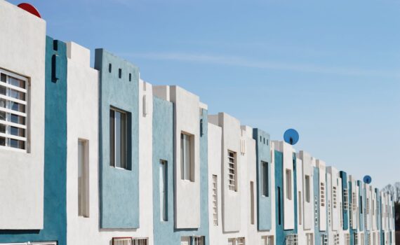 white and teal concrete buildings